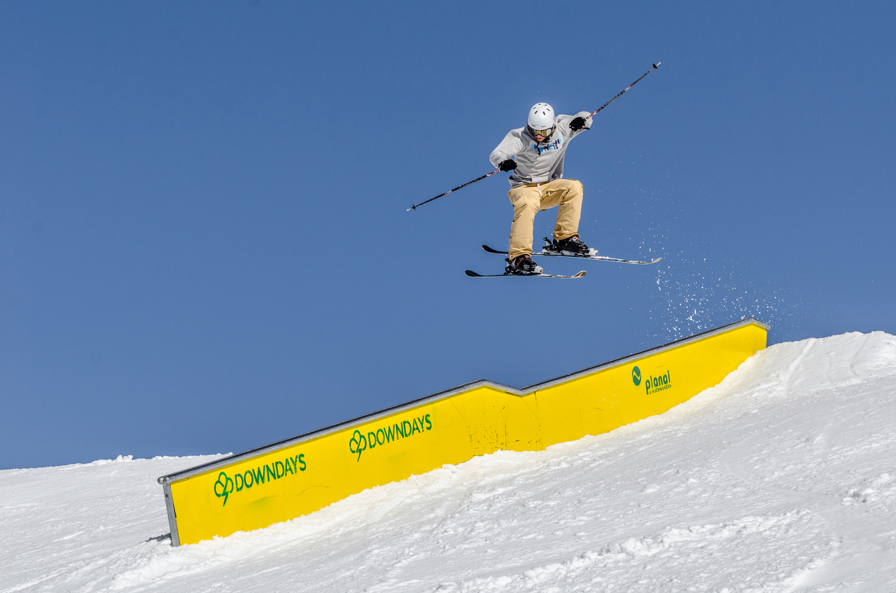 Josef Steger gapping into the down flat down rail at Superpark Planai captured by Christian Riefenberg