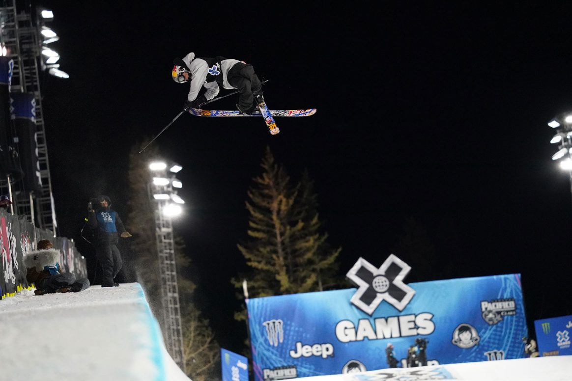 Birk Irving grabs double tail during the X Games 2021 Men's Ski Superpipe contest.