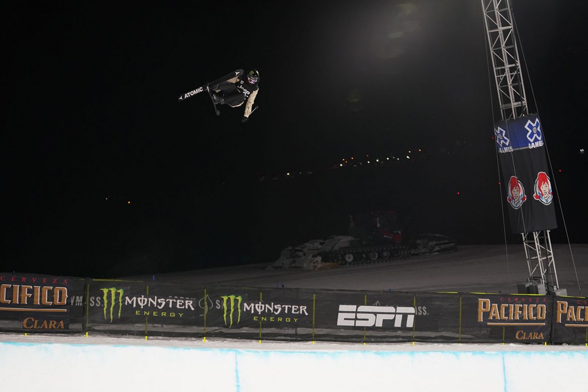 Gus Kenworthy sends a massive alley-oop flatspin during Men's Ski Superpipe at Winter X Games 2021 in Aspen, Colorado.