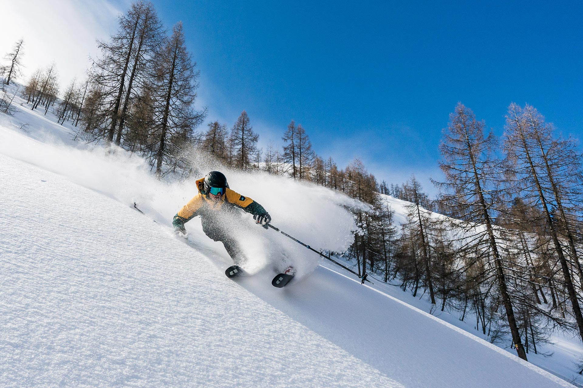 Nikki Sagmeister skis powder in Saalbach, Austria.